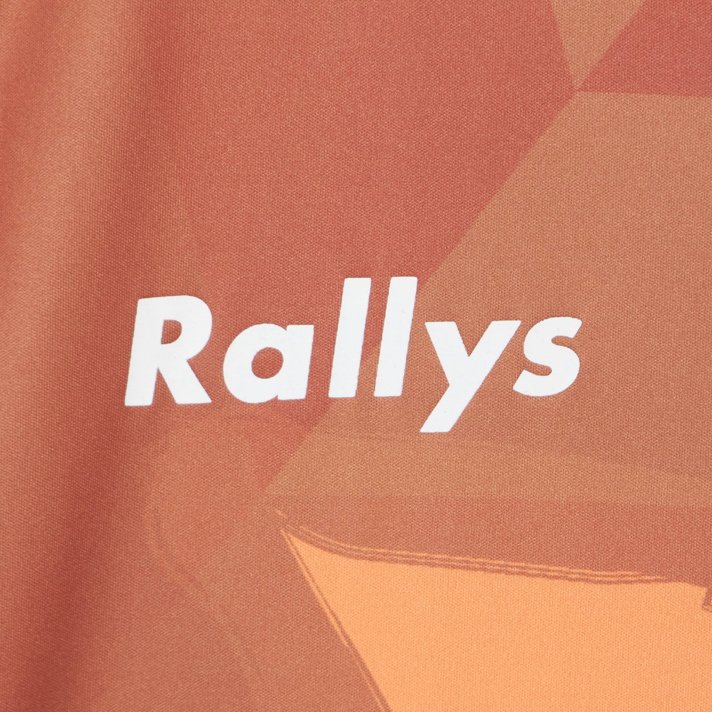 Rallys エーリオシャツ(サンセット)|公式戦で使える卓球ウェア