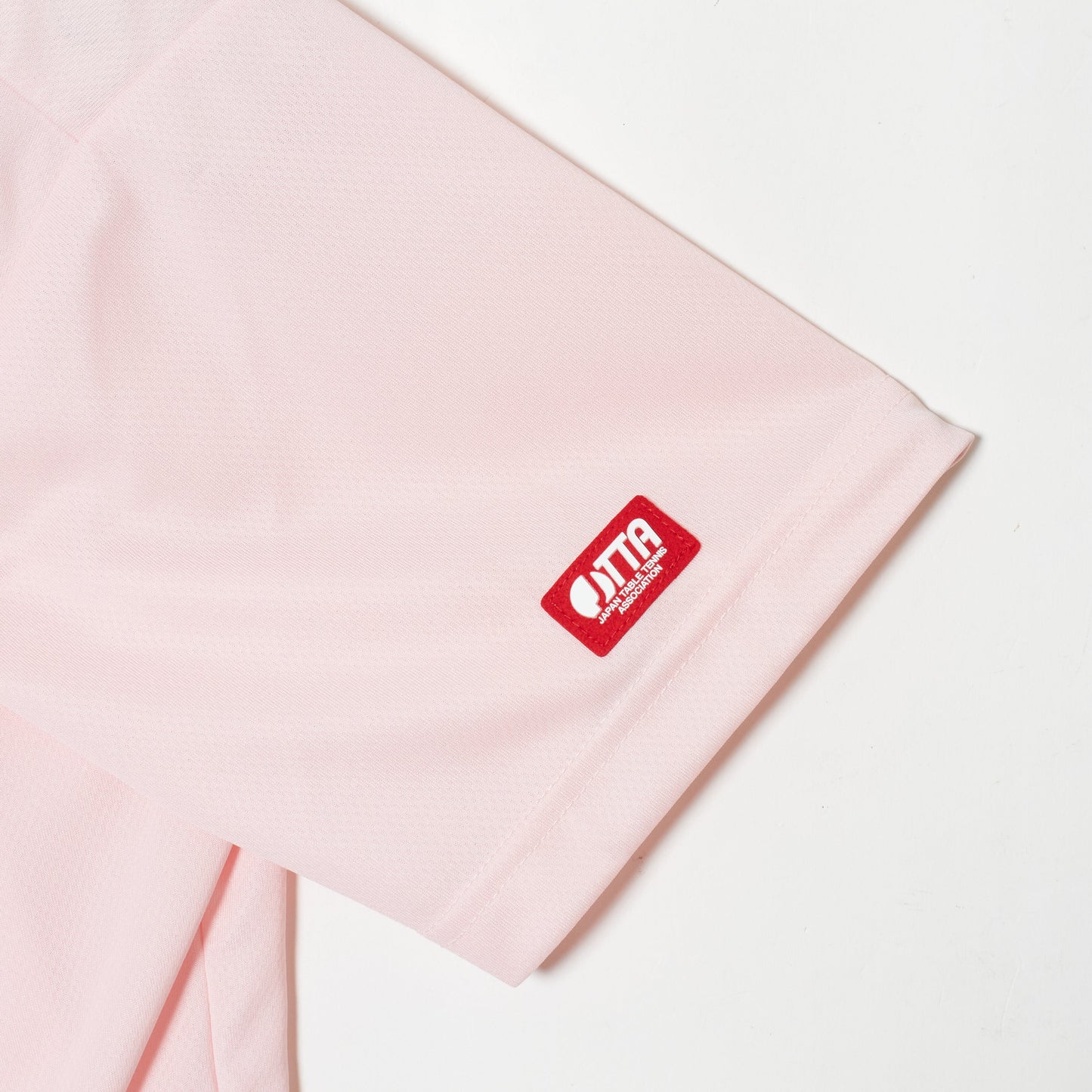 Rallys Tシャツ(ピンク・ロゴ大)|公式戦でも使える卓球Tシャツ